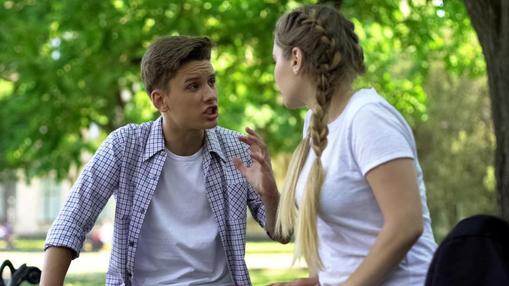 two young people talking