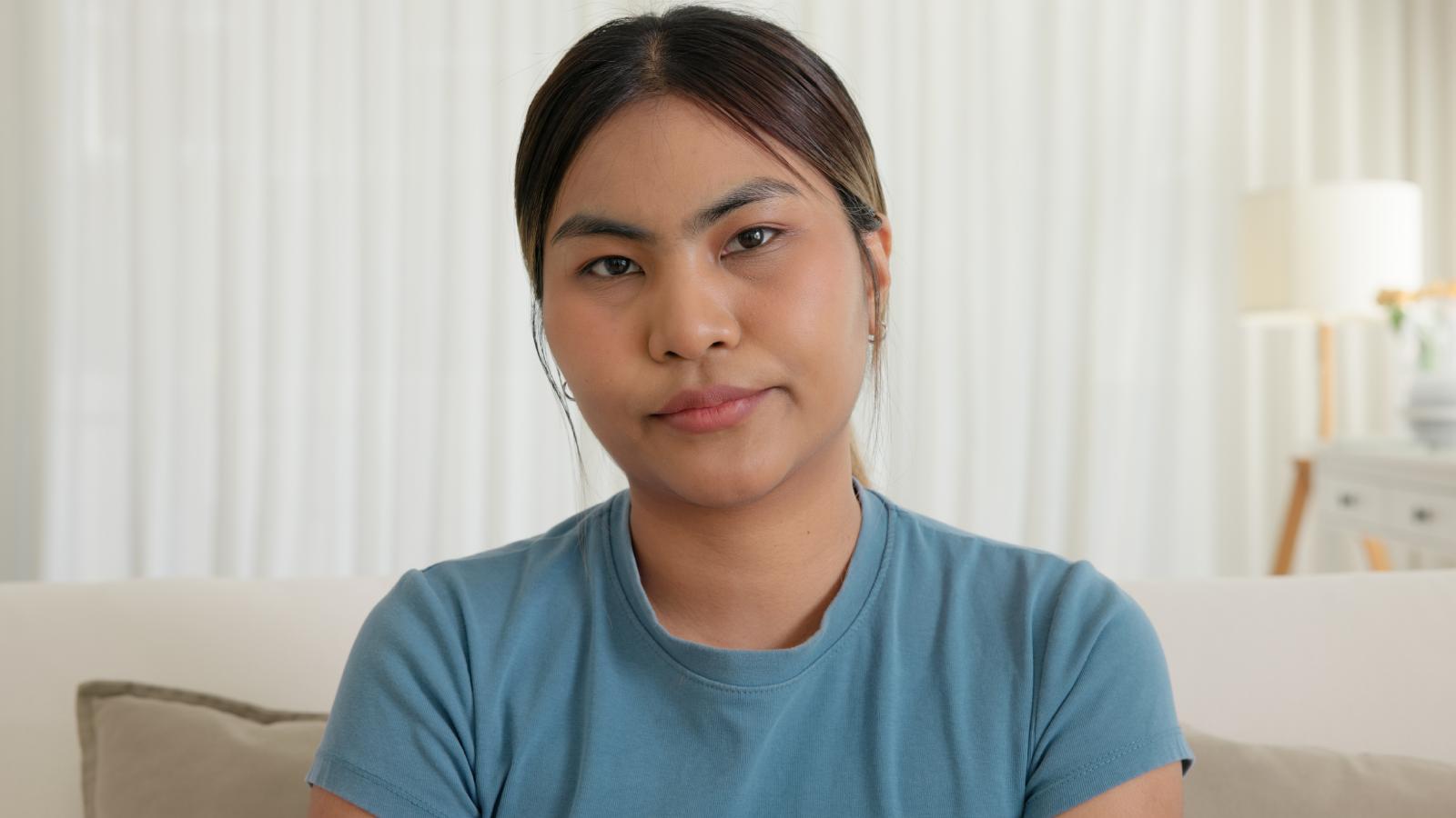 woman with a serious expression
