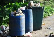 A Homeowner Got Tired Of Picking Up Their Neighbor’s Trash, So They Started Putting Their Garbage Cans In The Spot They Use To Teach Them A Lesson
