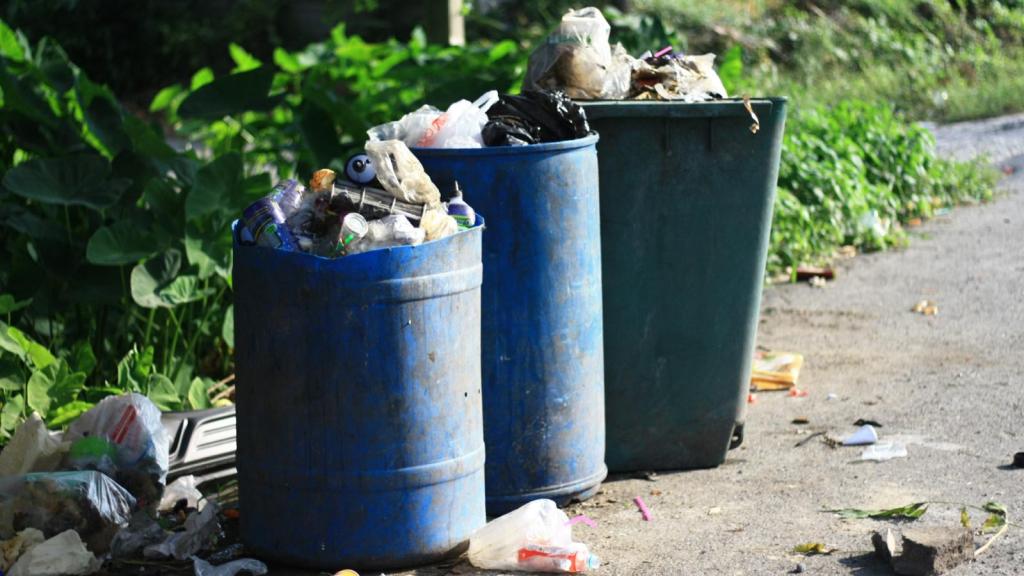 trash cans on a street