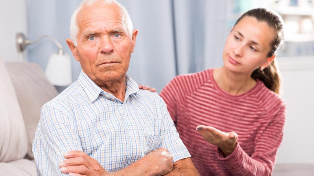 woman talking to her father
