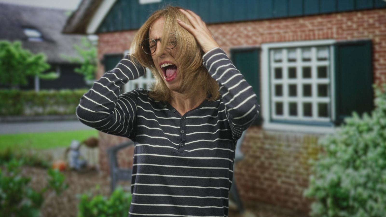 woman yelling in her yard