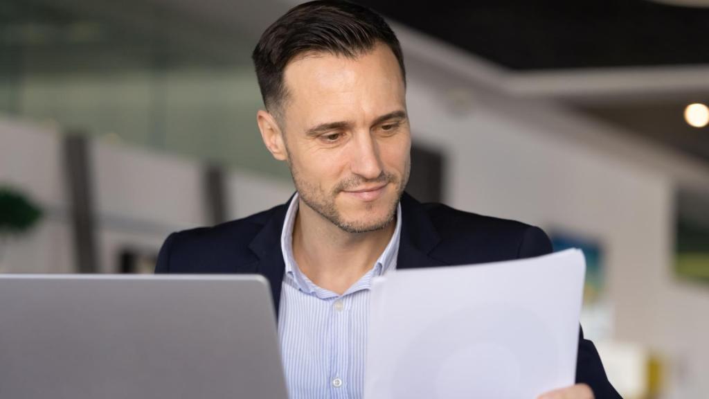 man looking at documents