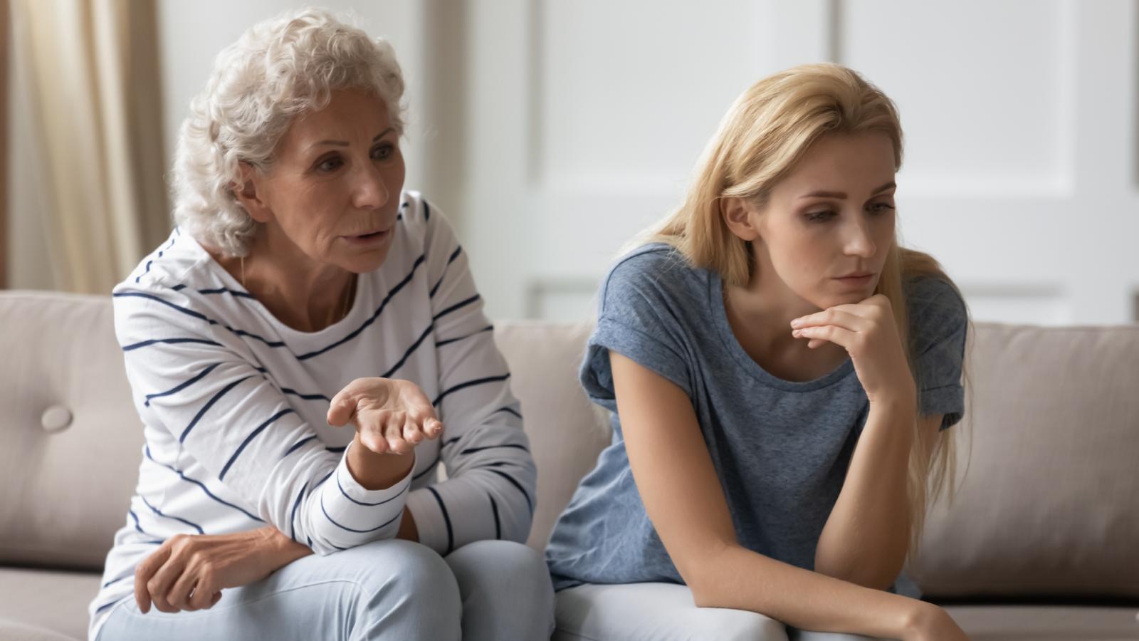 After One Criticism Too Many, She Told Her Mom She Wasn’t Coming Home for the Holidays women on a couch