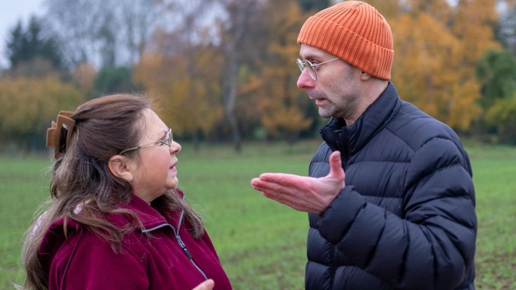 man and woman having a conversation