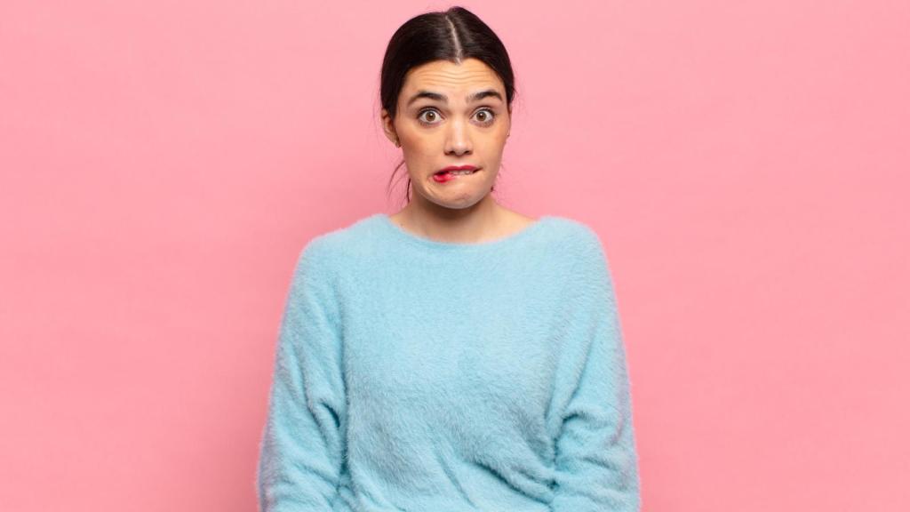 woman with a nervous expression