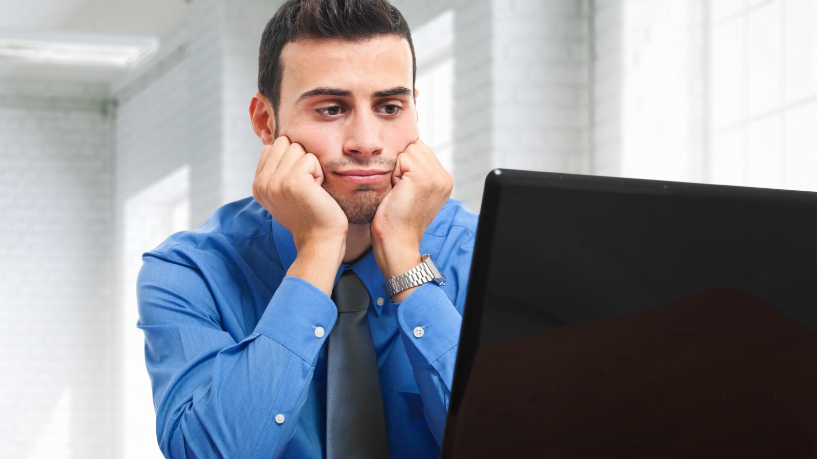 He Enjoys Cleaning and Fixing Things at Home, but His Job Leaves Him Feeling Empty man bored at his desk