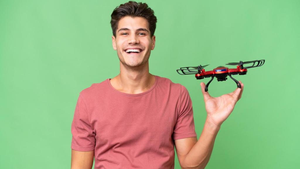 man holding a drone