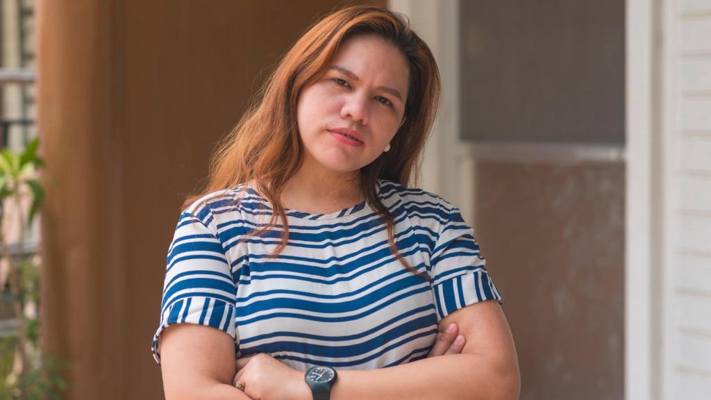 woman with a serious expression