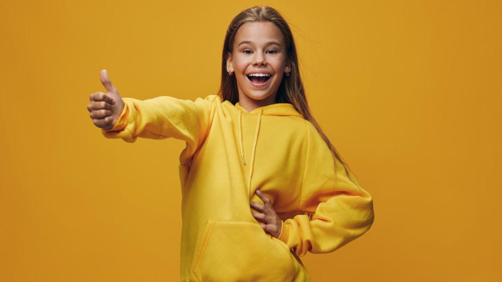 girl giving a thumbs up
