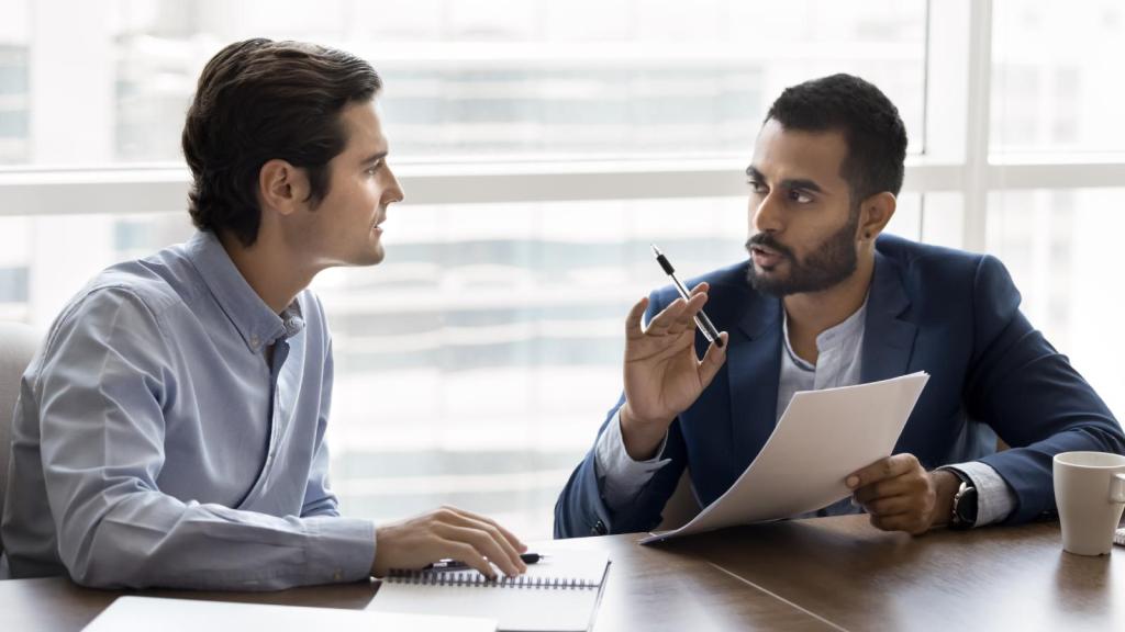 two men in an office