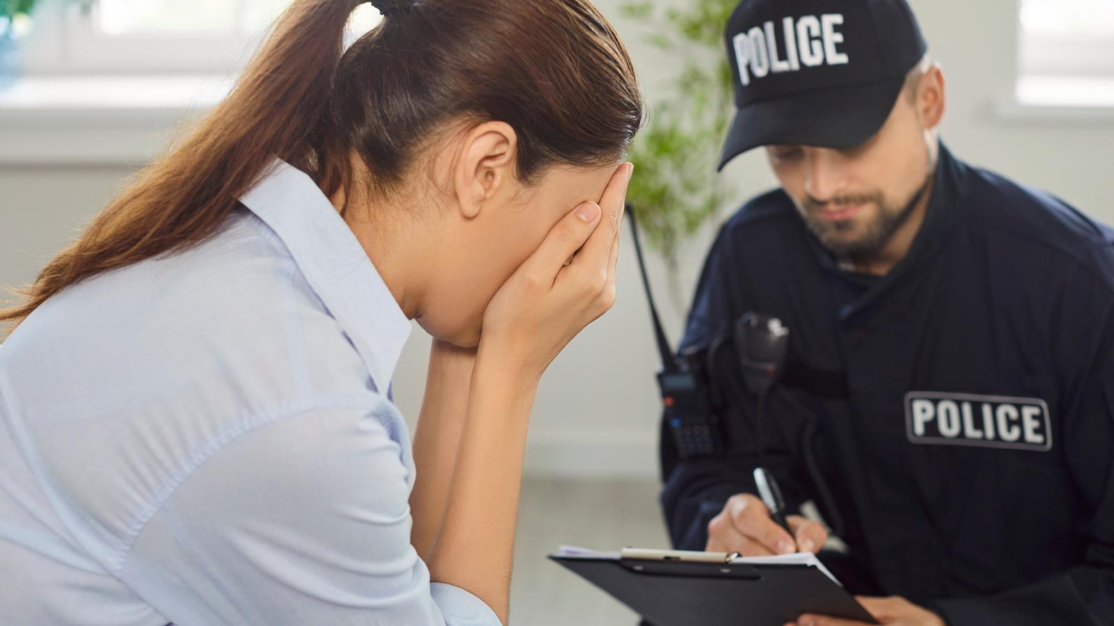 woman talking to a cop