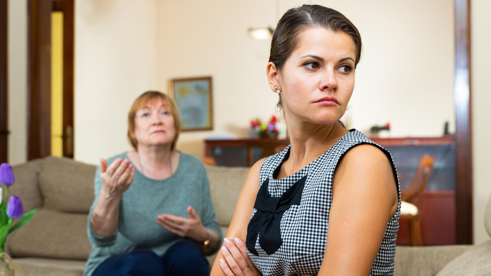 Woman Drastically Cuts Back on Visiting Her Mom to Protect Her Relationship woman talking to her mother