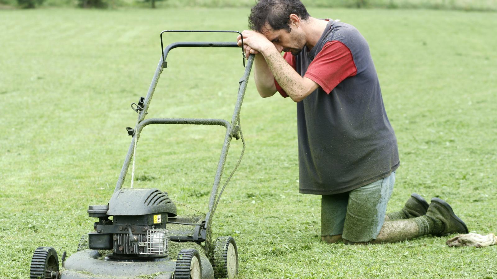 Im Done: Why a Grown Man Boldly Refused to Ever Touch His Fathers Lawn Mower Again man mowing a lawn