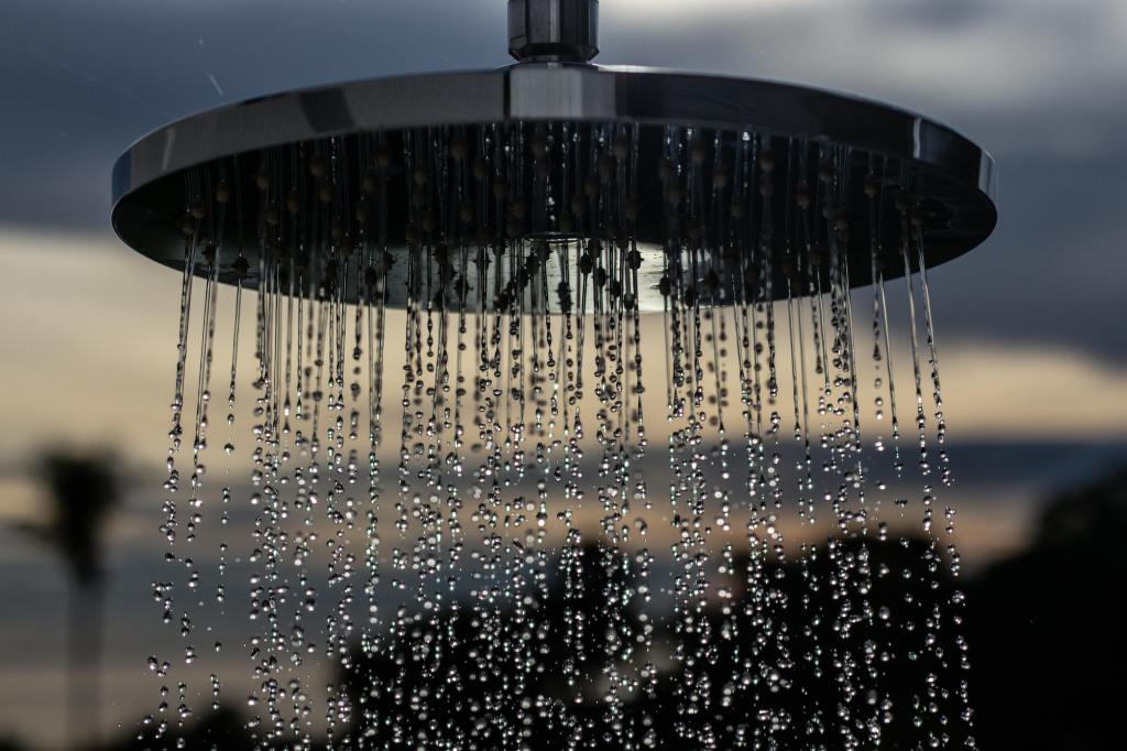 A shower running water face-down
