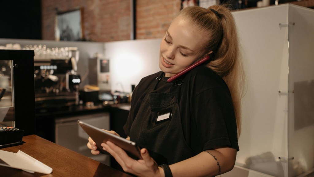employee holding a tablet
