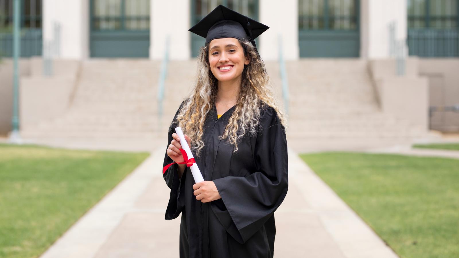 “Too Little, Too Late”: A Graduate’s Bold Response to the Father Who No Showed on Her Big Day woman graduating from college