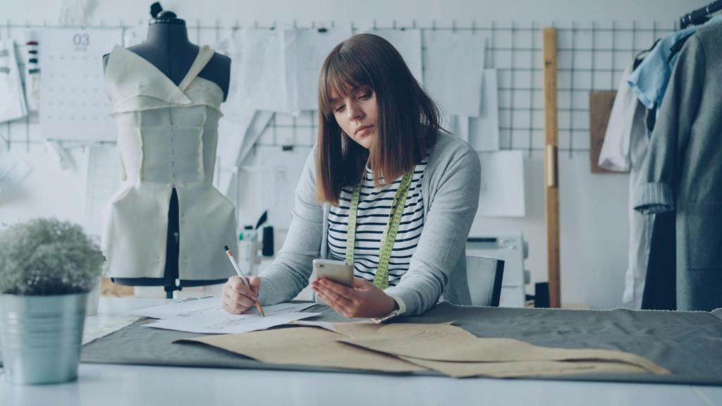 seamstress working on dress alteration