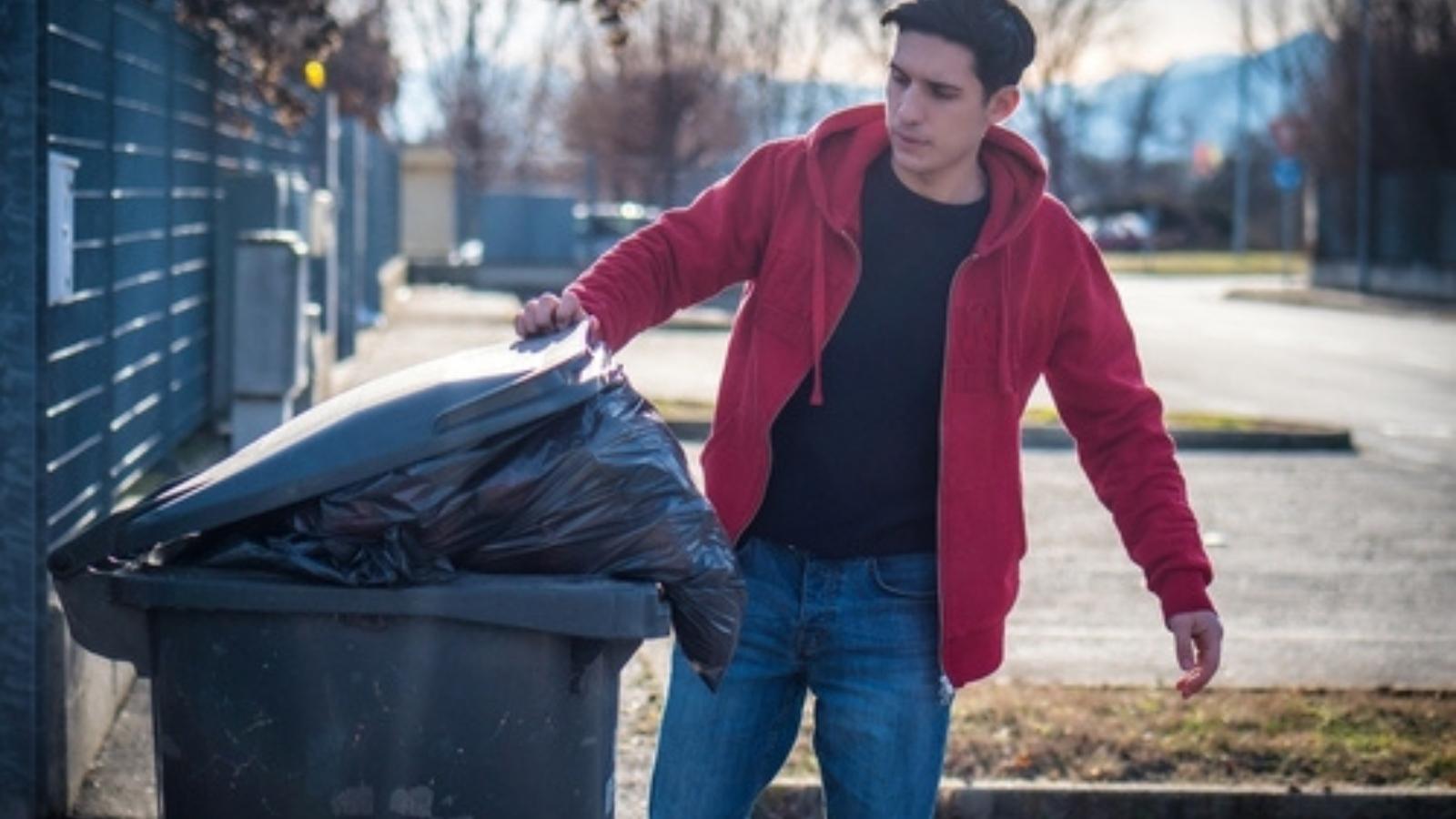His Neighbor Kept Dumping Trash Outside His Door, so He Returned It in a Way the Man Couldn’t Ignore Man with trash