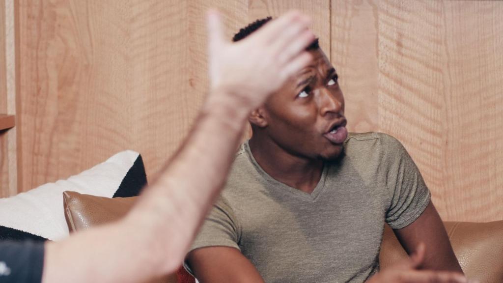 two men arguing