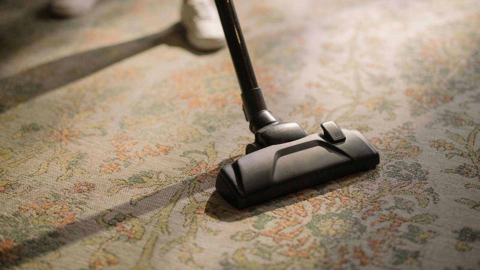 vacuum on a floral rug