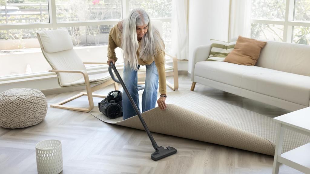 woman vacuuming a room