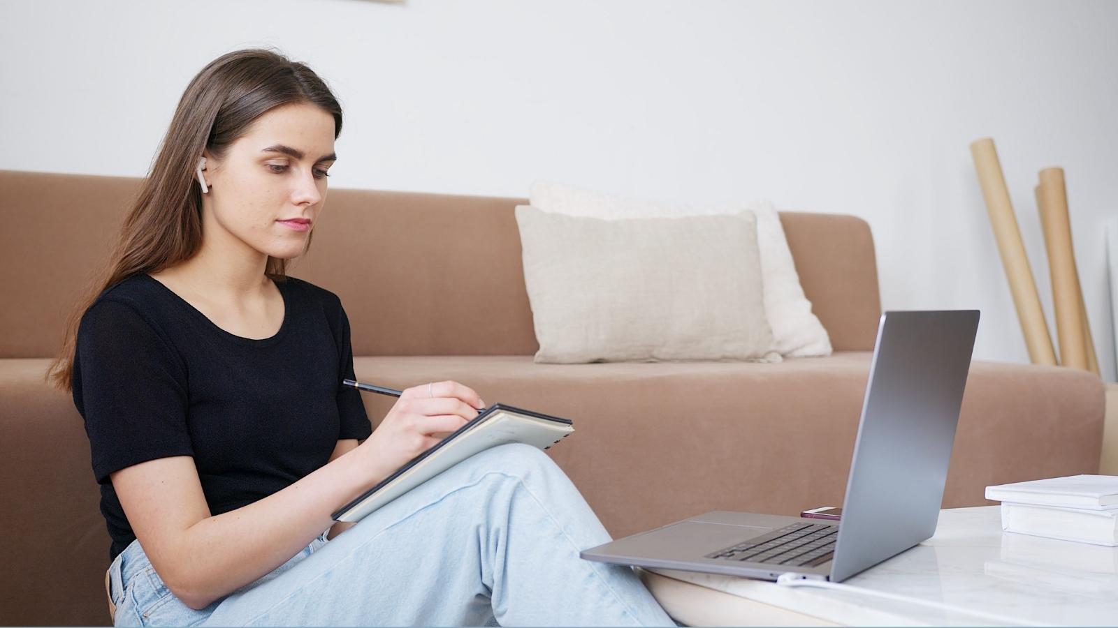 woman doing online therapy session