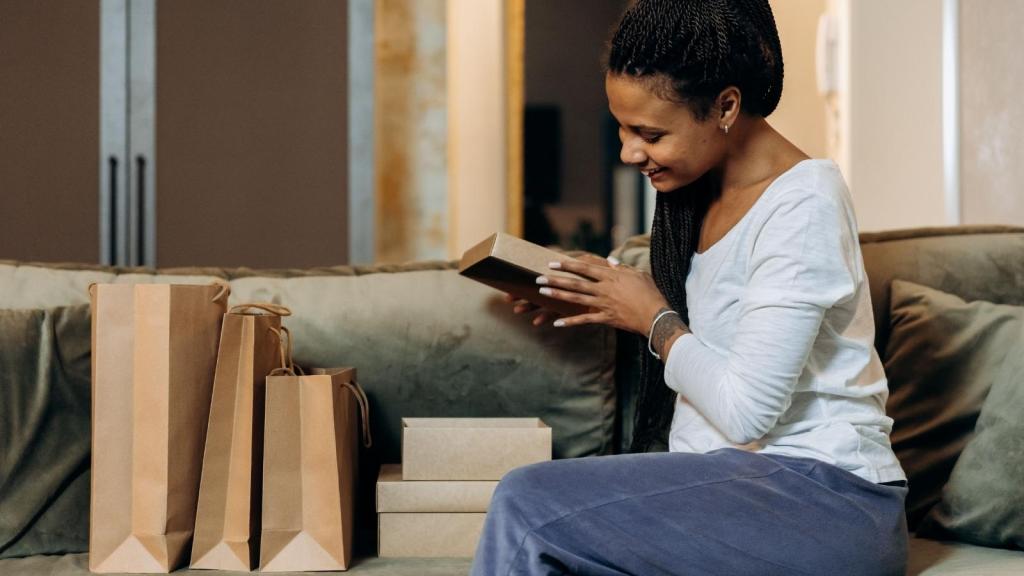 woman opening a gift