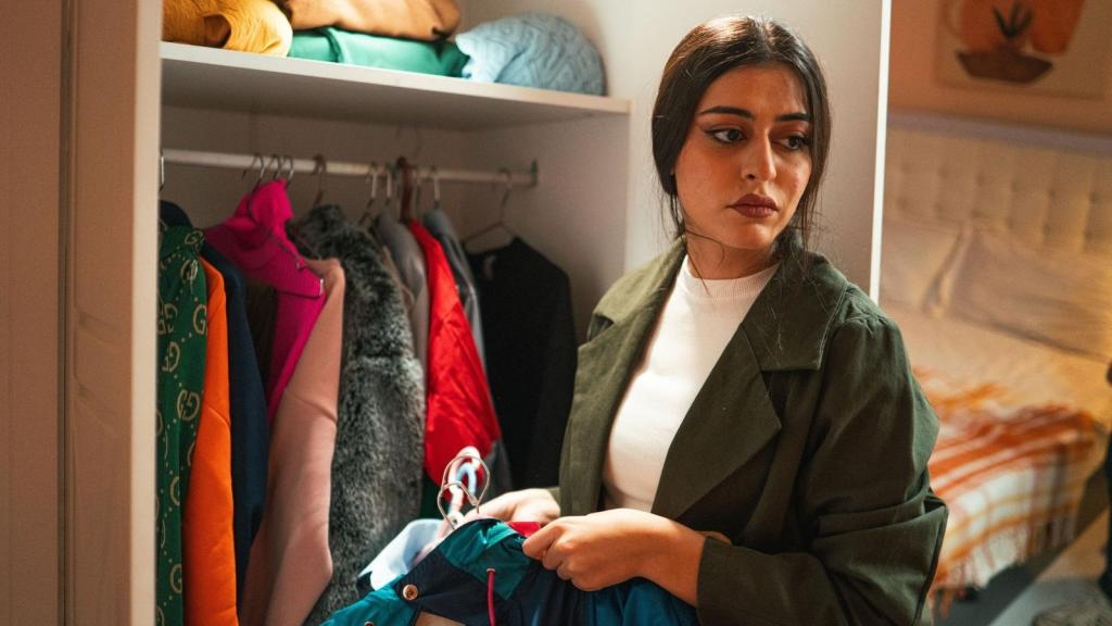 woman organizing her closet