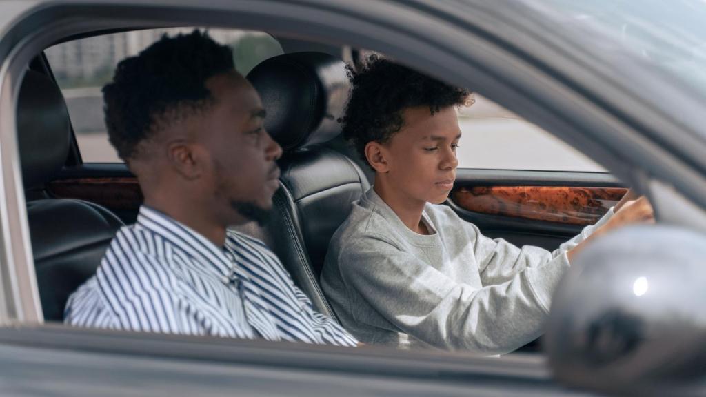 young man learning to drive