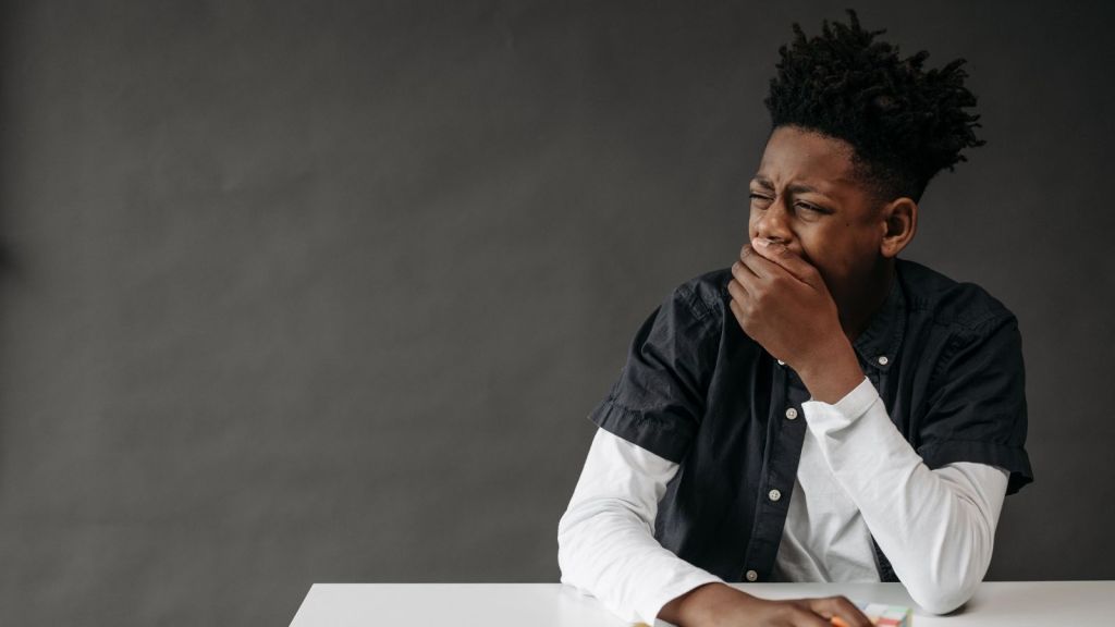 A man yawning