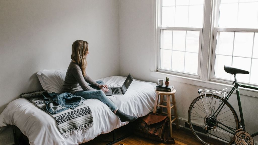 A college student in her dorm room