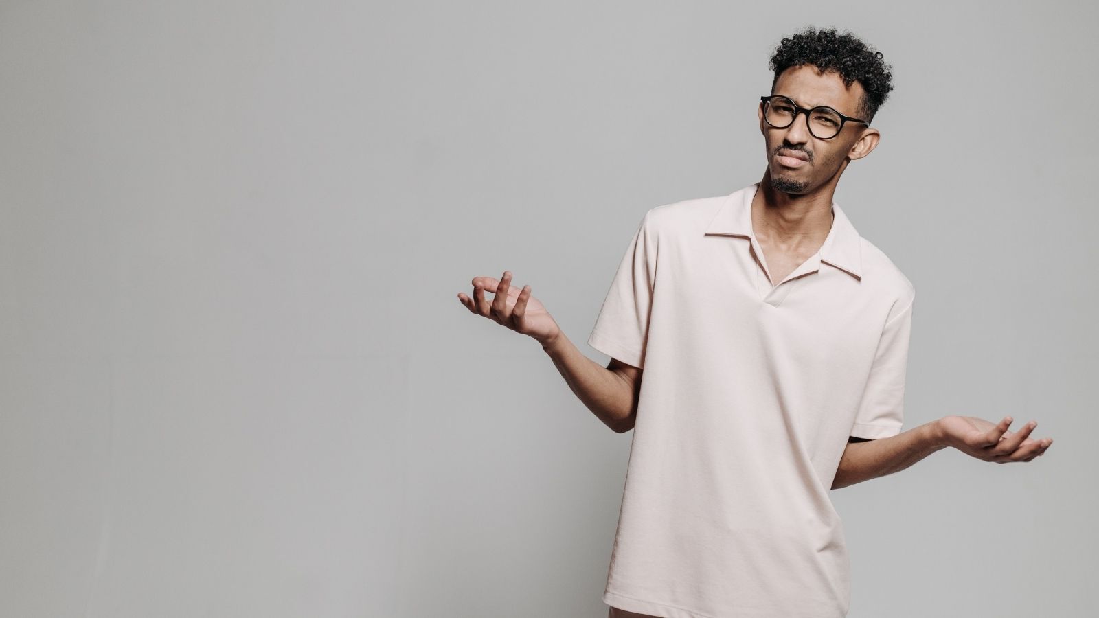 Two Customers Refused to Take ID Photos for the Same Reason, Leaving the Employee Unsure What to Do A guy looking confused