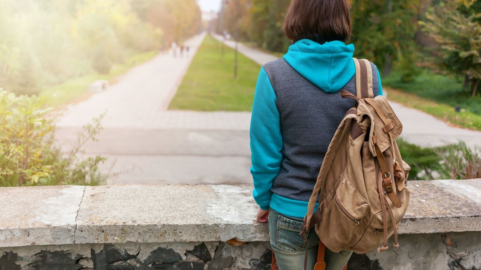 A woman carrying a backpack