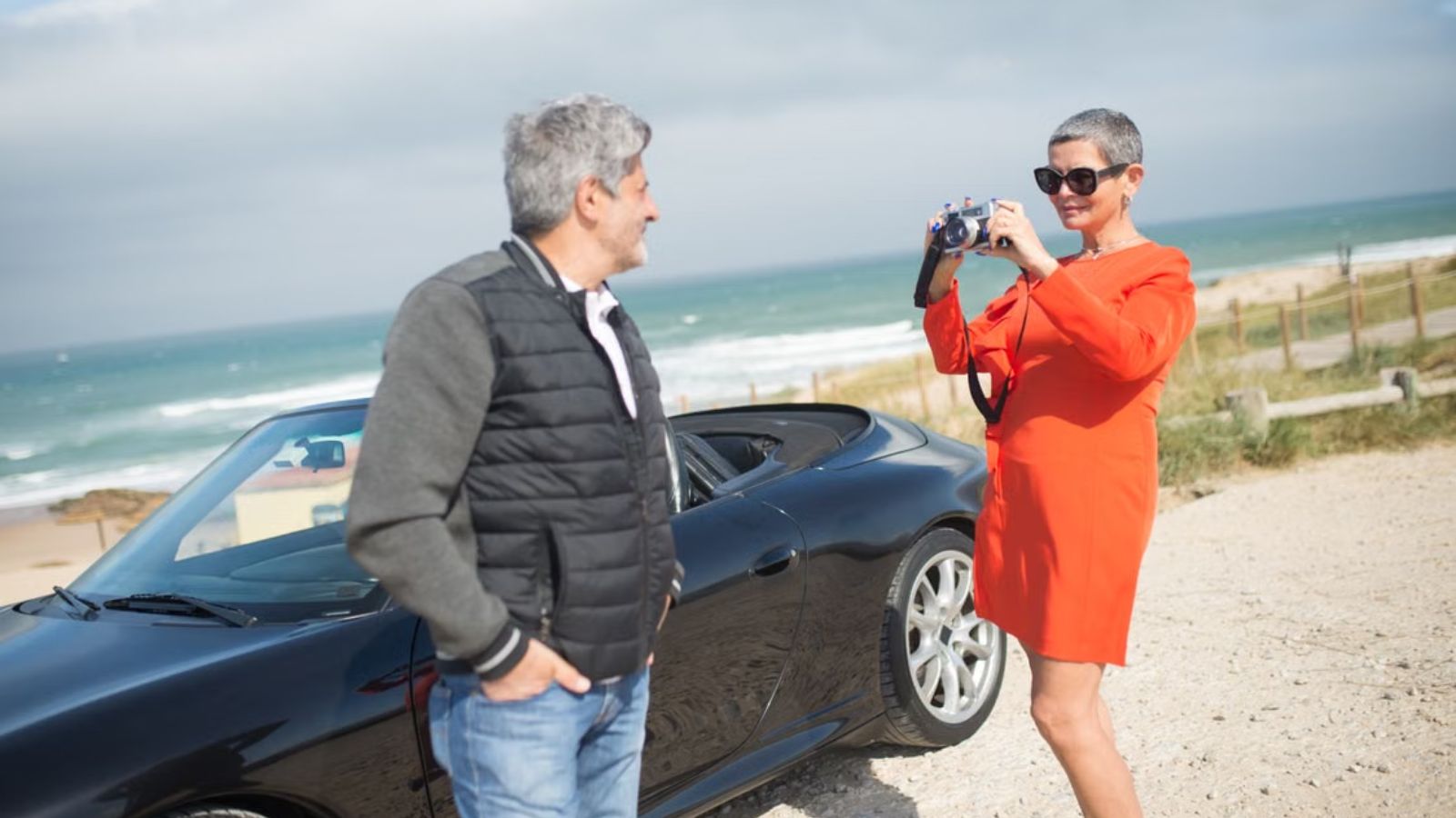 Why a Stressed Grandmother Refuses to Apologize for Going Radio Silent on Her Adult Kids Couple taking pictures at the side of the road while traveling