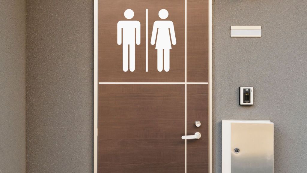Door of a public toilet for men and women