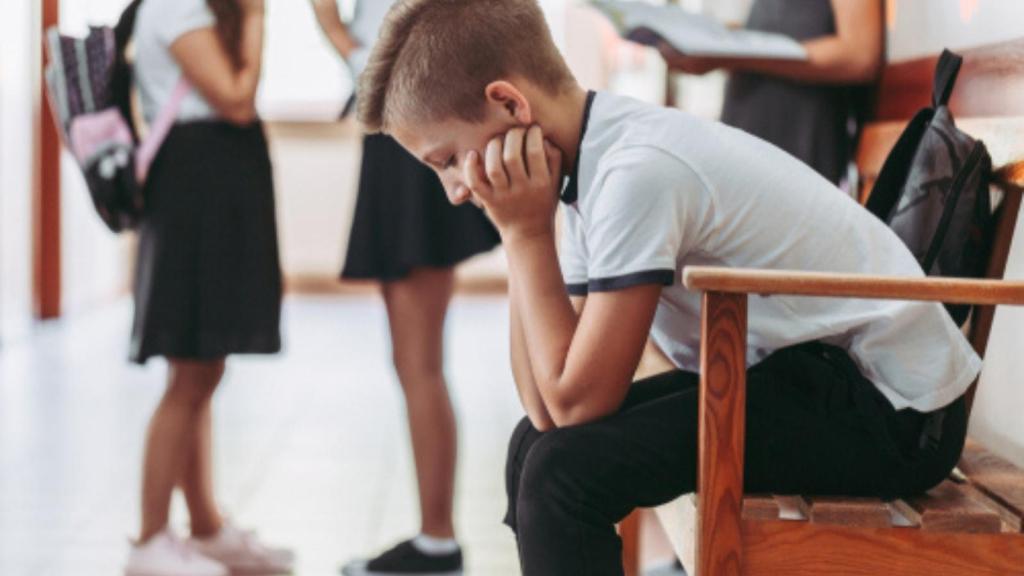 Kid sitting alone