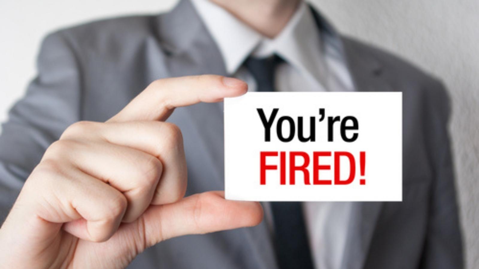 He Was Fired Because He Was Friends With the Bosss Assistant. The Brilliant Lawsuit That Forced His Ex Employer Into Total Submission. Man holding you're fired card.