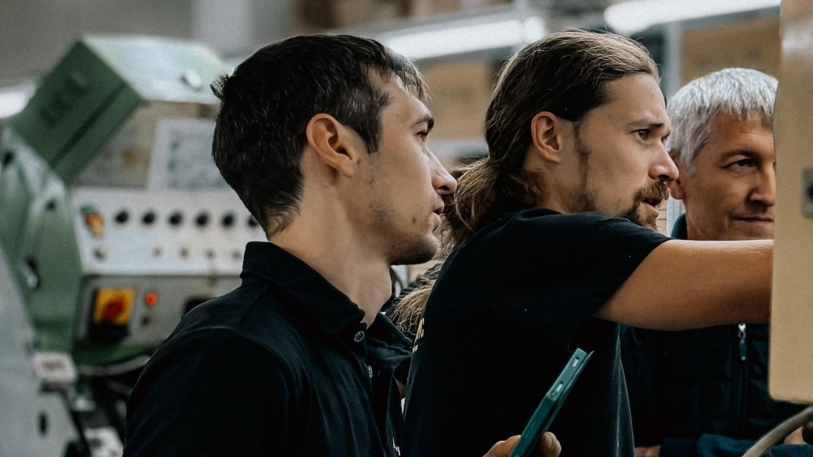 They Sparked the Torch Without Looking Through the Drywall. The Mind Boggling Story of a Steel Mill Maintenance Crew That Vaporized the Local Network. IT employees looking at back of computer
