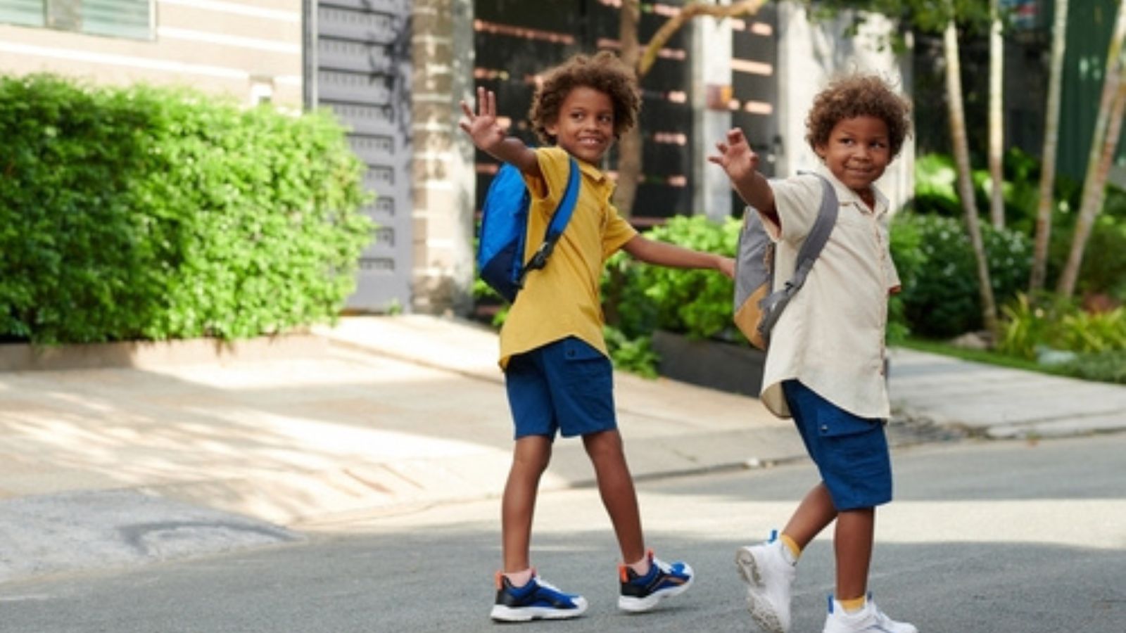 Kids waving