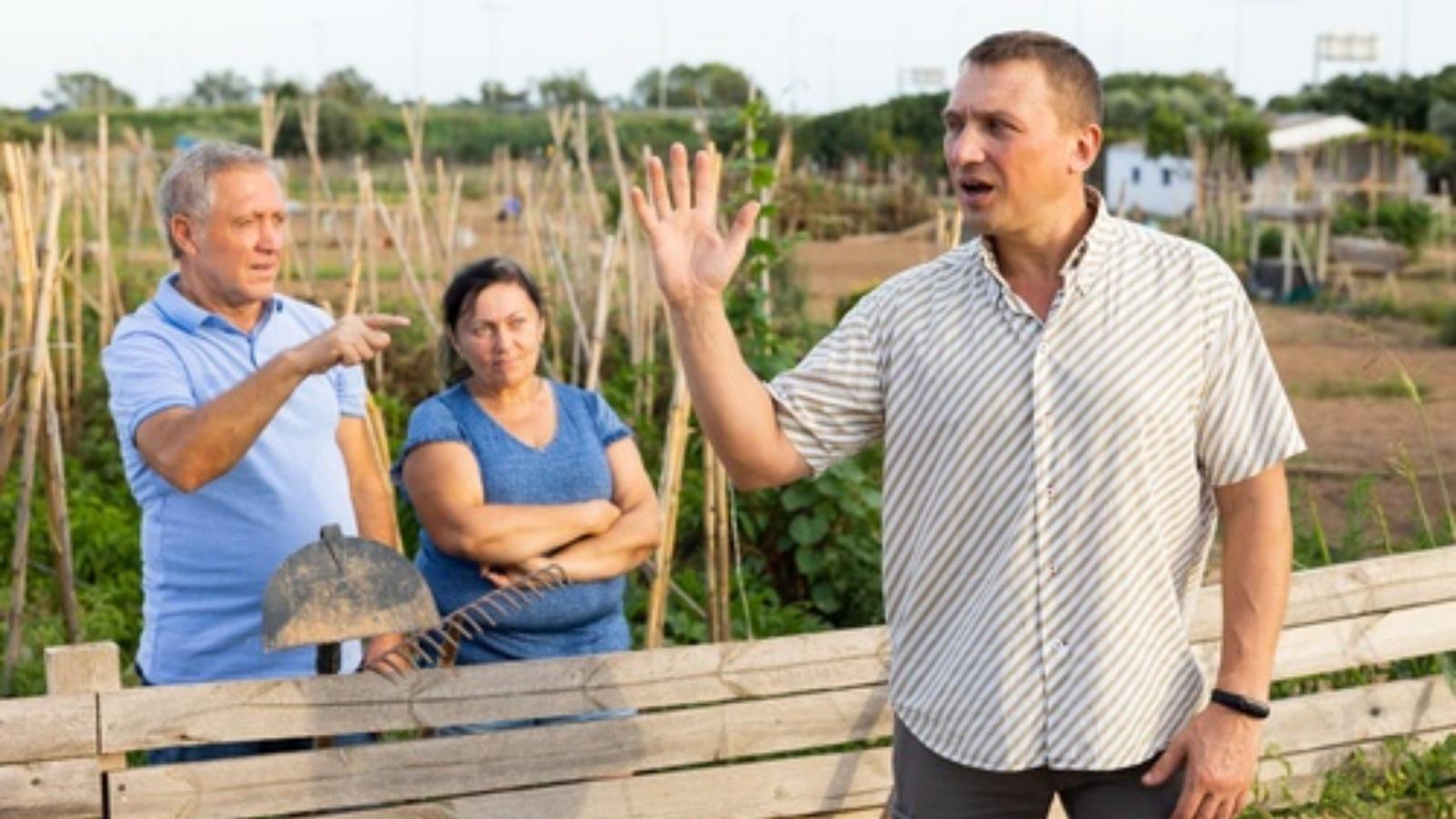 They Reported Their Neighbor’s Illegal Drainage Issue. The Onslaught of Retaliatory Harassment Forced Them to Take Legal Action. Neighbors fighting