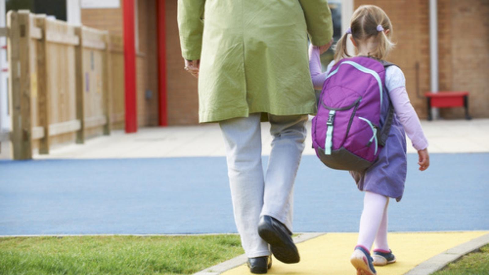 The Entitlement Trap: Why a Working Mom Is Being Ostracized by In Laws for Prioritizing Her Own Job Mom and daughter walking to school