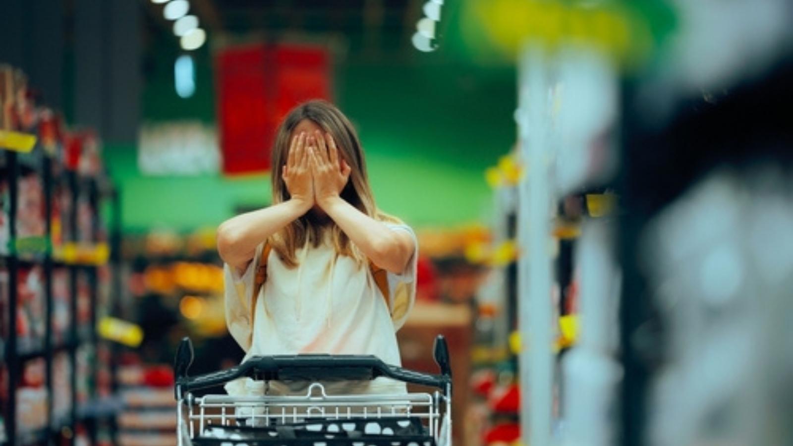 She Was Just Trying to Do Some Grocery Shopping. The Hilarious Reality of Getting Mistaken for an Employee Twice in One Day. Shopper covering her face