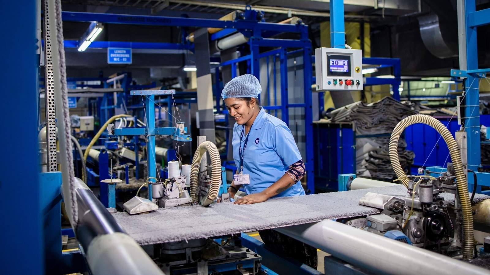 A Customer Left for a Competitor and Asked for the Updated Recipe on the Way Out, But The Manufacturer Gave Them the Original Instead Woman working in a factory making carpets