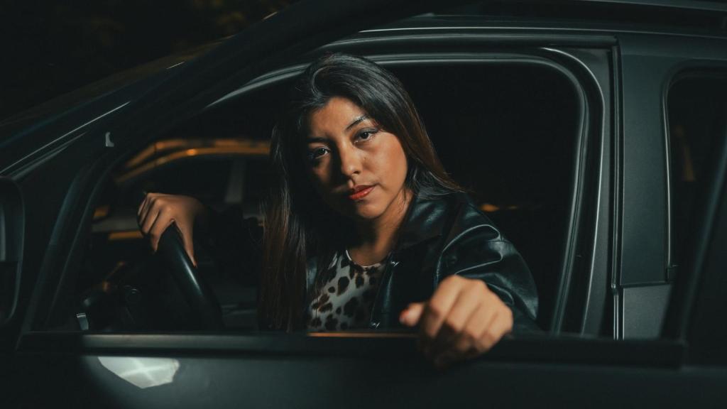 Woman upset and sitting in her car