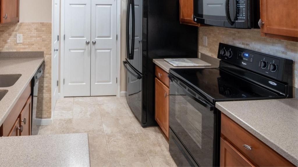Glass top stove in a rental kitchen