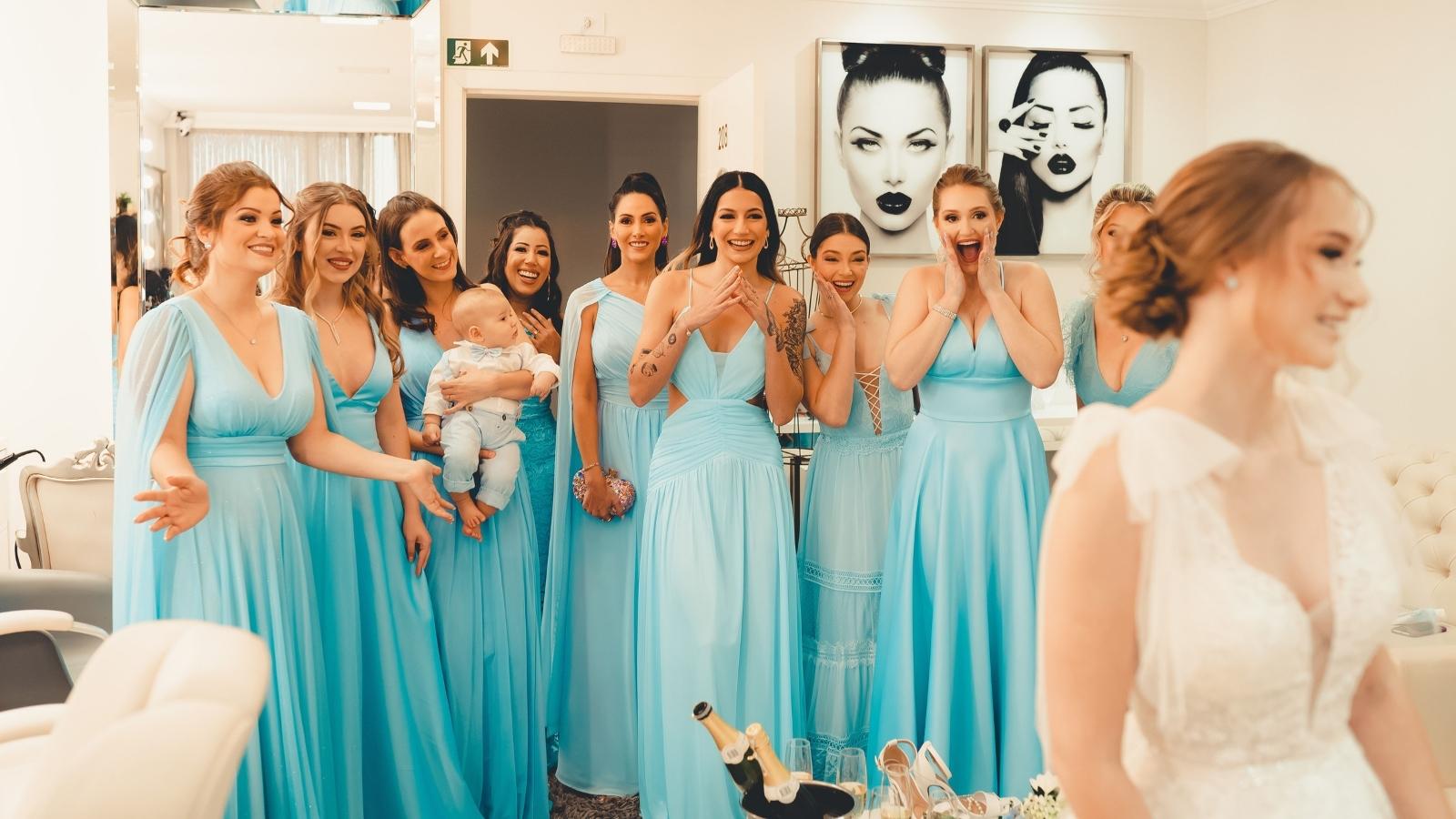 She Exhausted Every Single Compromise. Now a Bride Is Telling Her Sister in Law to Wear the Dress or Step Down Completely. Group of bridesmaids wearing blue dresses