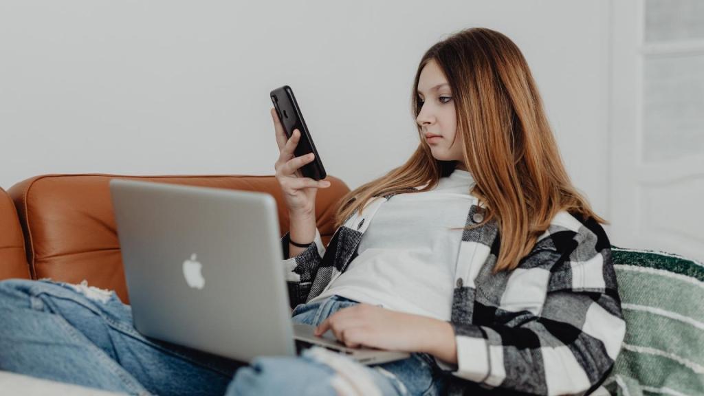 17 year old looking at her phone