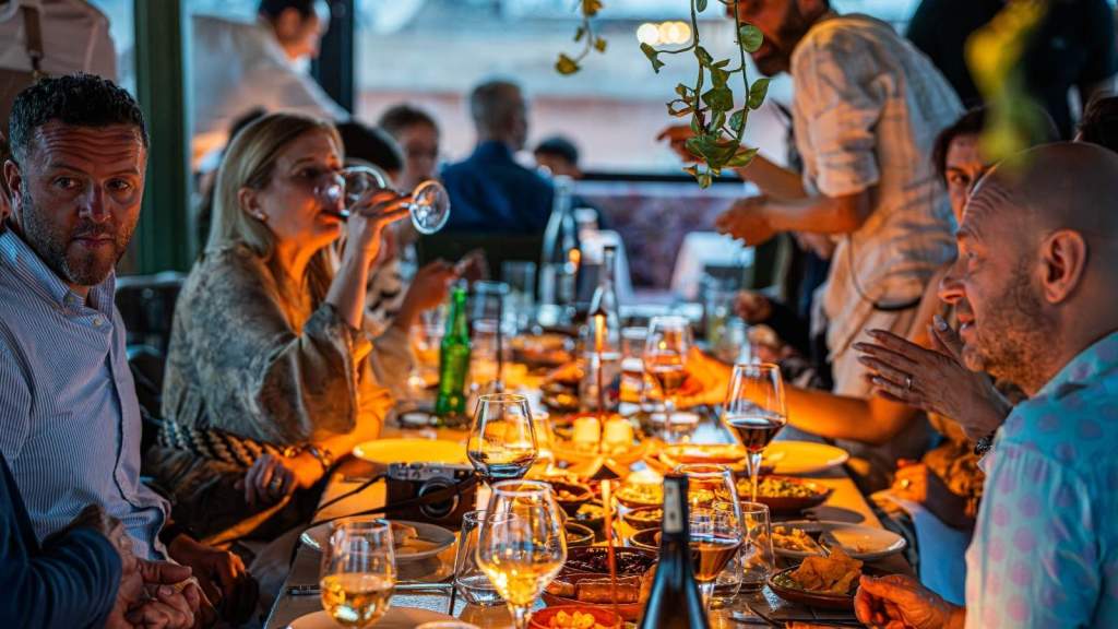 Group of people eating at a restaurant