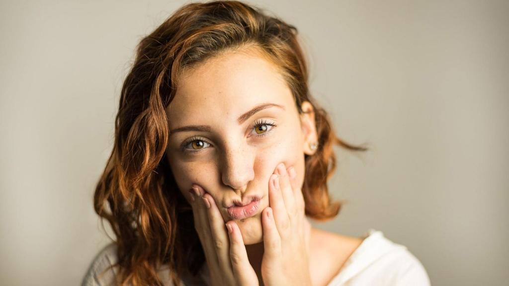 Woman making a silly face after ridiculous customer